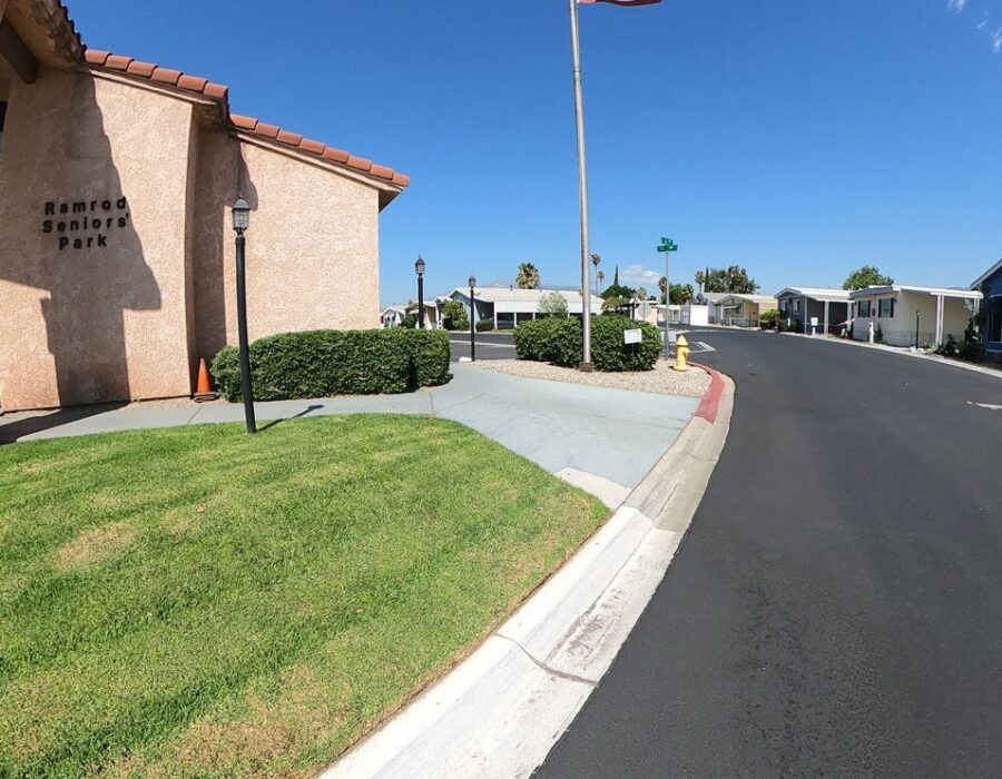Ramrod office with road and houses in the background.