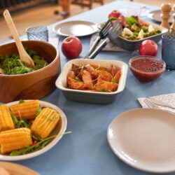 Food on a table for a pot luck.